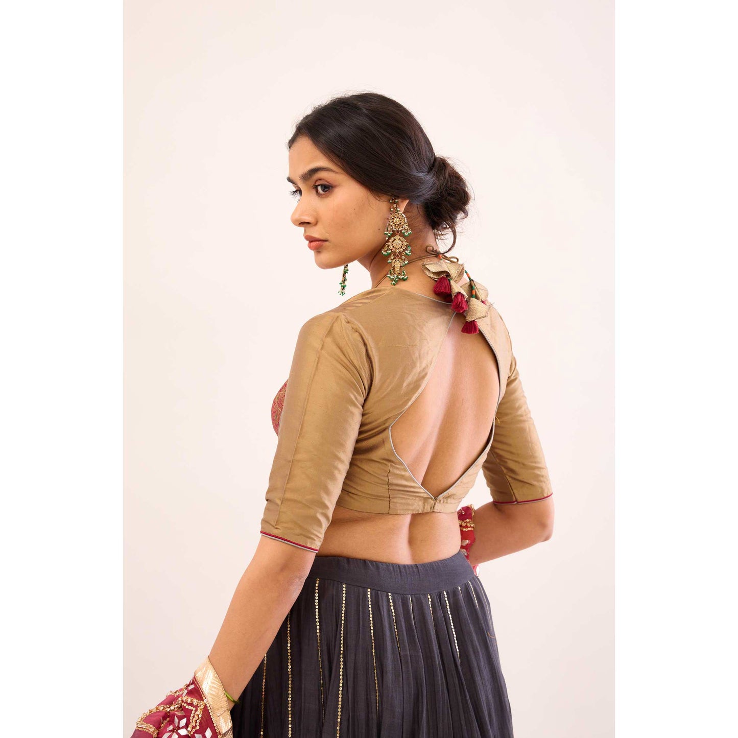 Indrani Lehenga Selaiti and Surkh