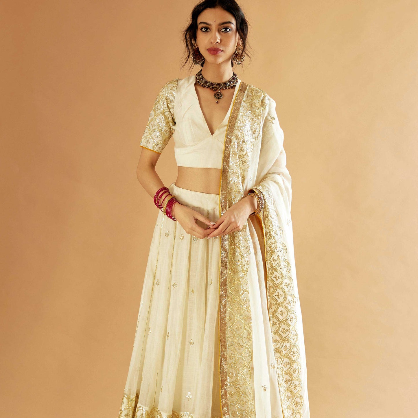 Indrani Lehenga Selaiti and Surkh